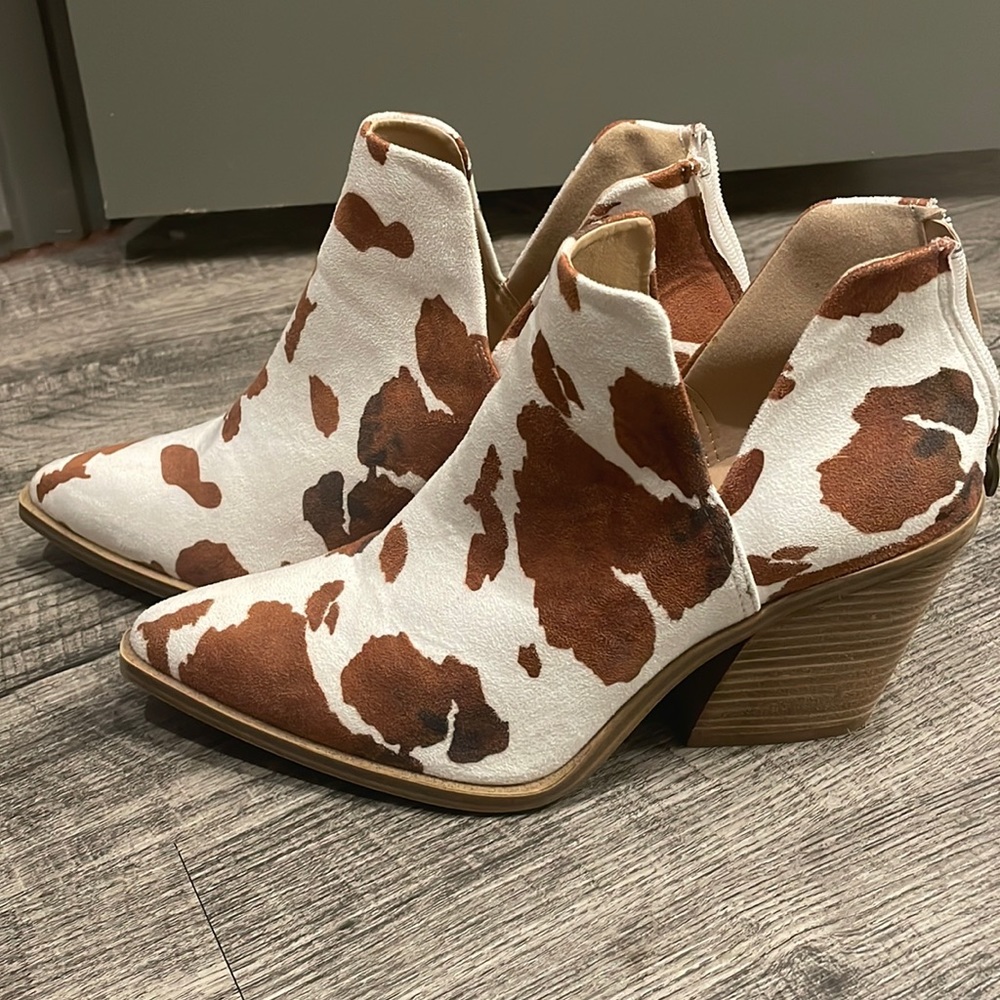 Cow print suede booties